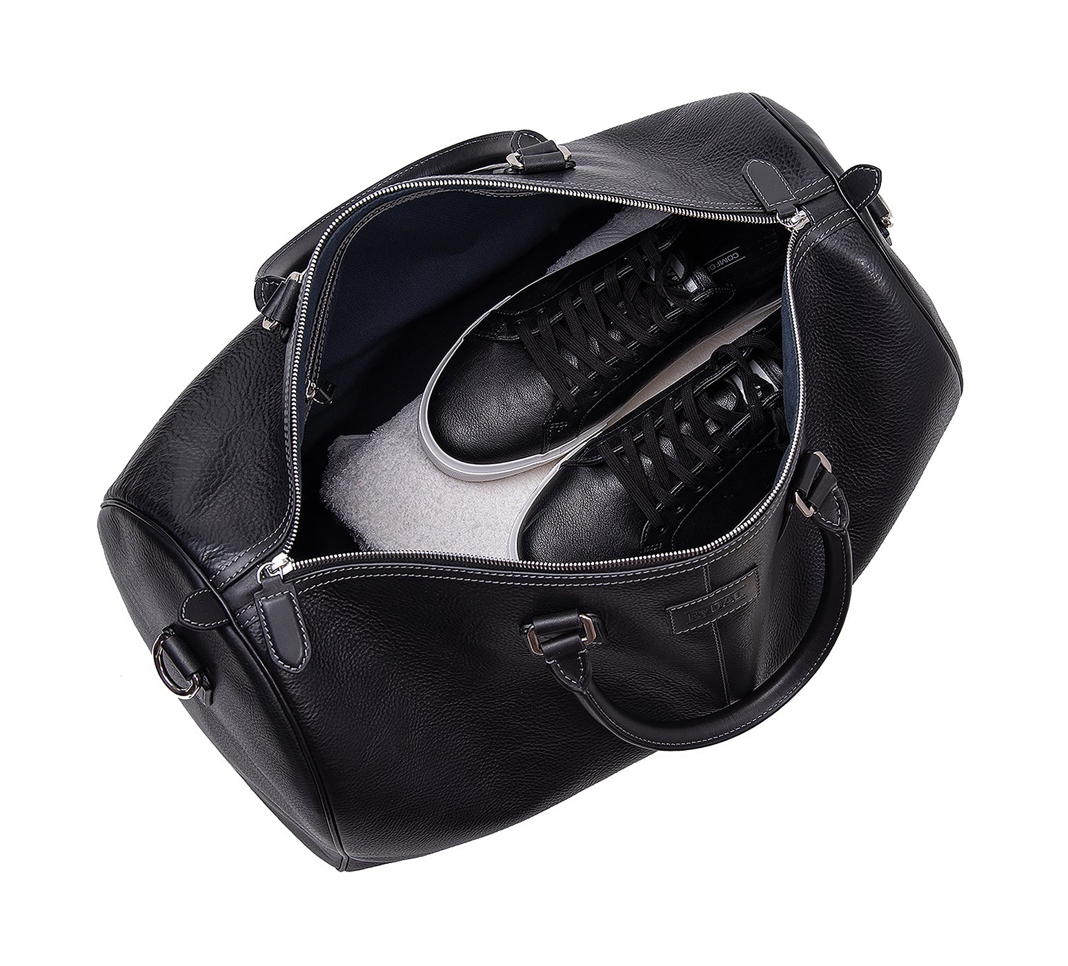 The Portland Mens Leather Travel Bag from Rydal in 'Black' showing interior with clothing.