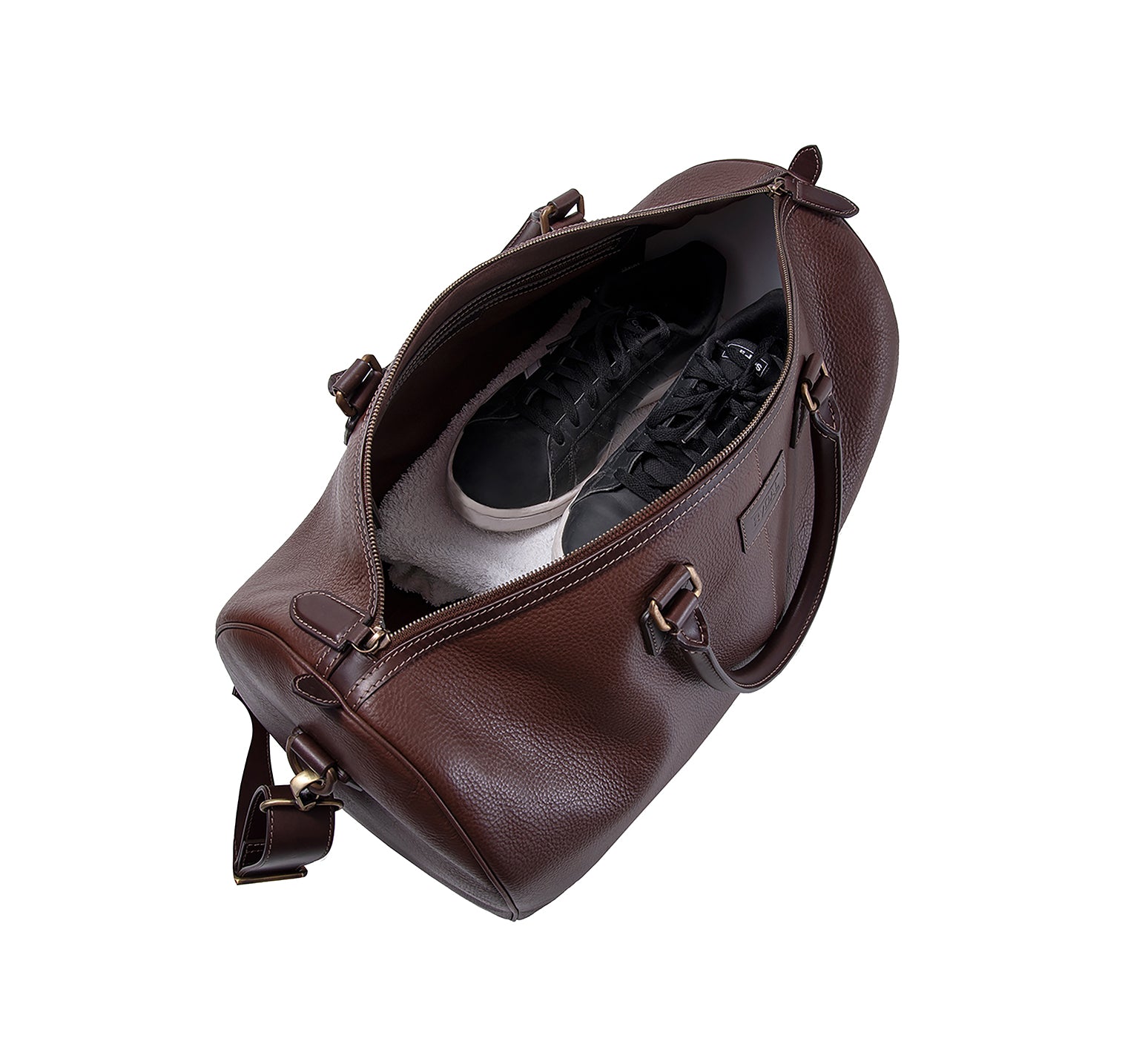 The Portland Mens Leather Travel Bag from Rydal in 'Dark Brown' showing interior with clothing.