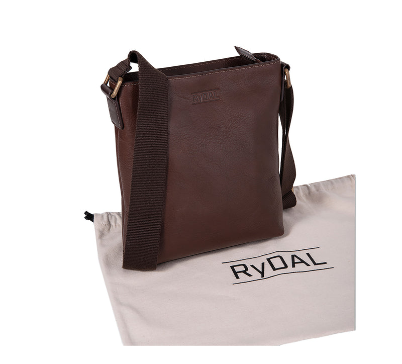 The Lucca Mens Leather Shoulder Bag from Rydal in 'Dark Brown' with cotton bag.